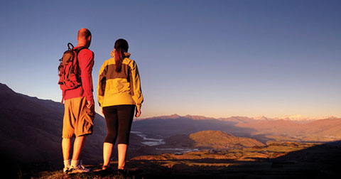 couple outdoors overlooking scenic views